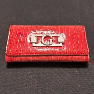 Guess trifold wallet. Barely used.